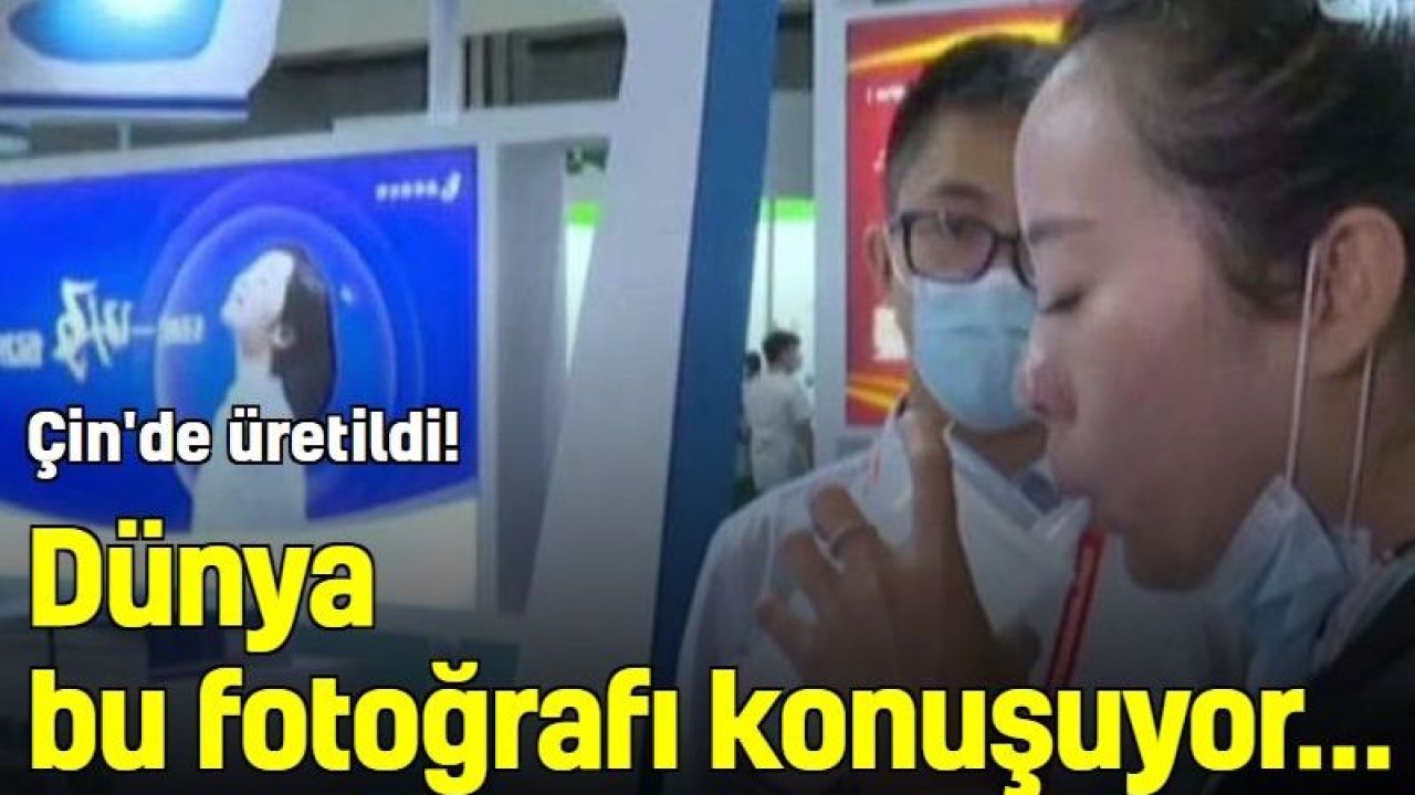 Dünya bu fotoğrafı konuşuyor... Çin'de üretildi Covid-19'a karşı solunum yoluyla aşılama çalışması